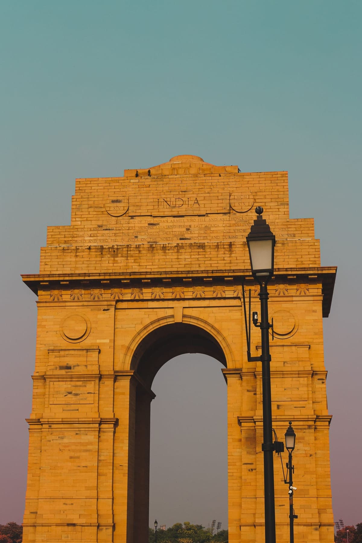 India Gate in Delhi lit gold in late afternoon light